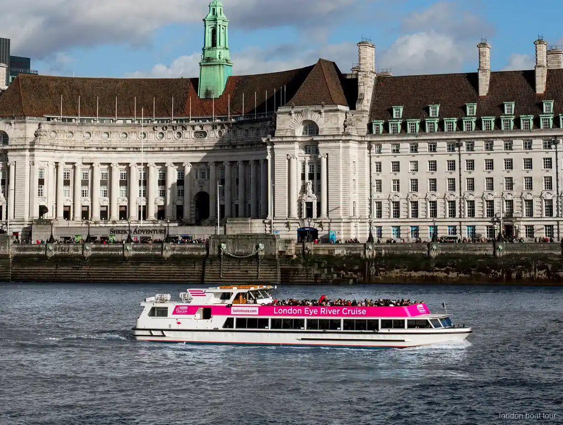 Guide som pekar ut Londons landmärken på London Eye flodkryssning combo