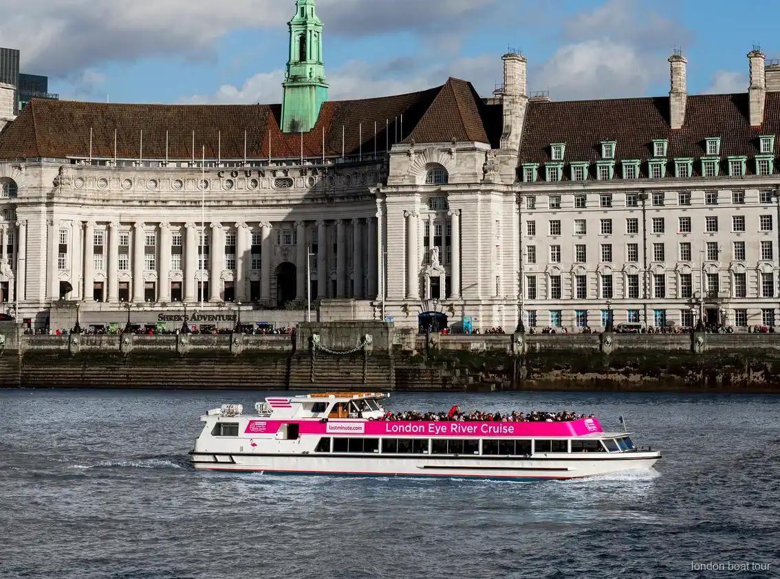 Guide peger på Londons landmærker på London Eye sejltur kombi