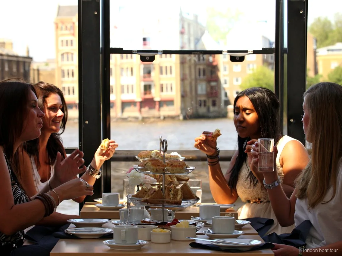 Tiered cake stand served during a Thames river cruise afternoon tea experience